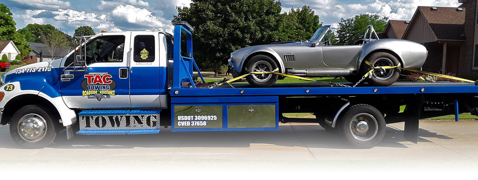 Flatbed Towing A Vintage Car